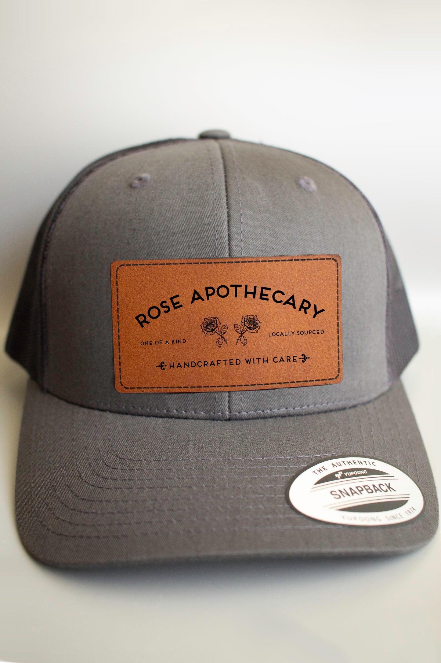Schitt’s Creek Series Rose Apothecary Trucker Cap with Leatherette Patch